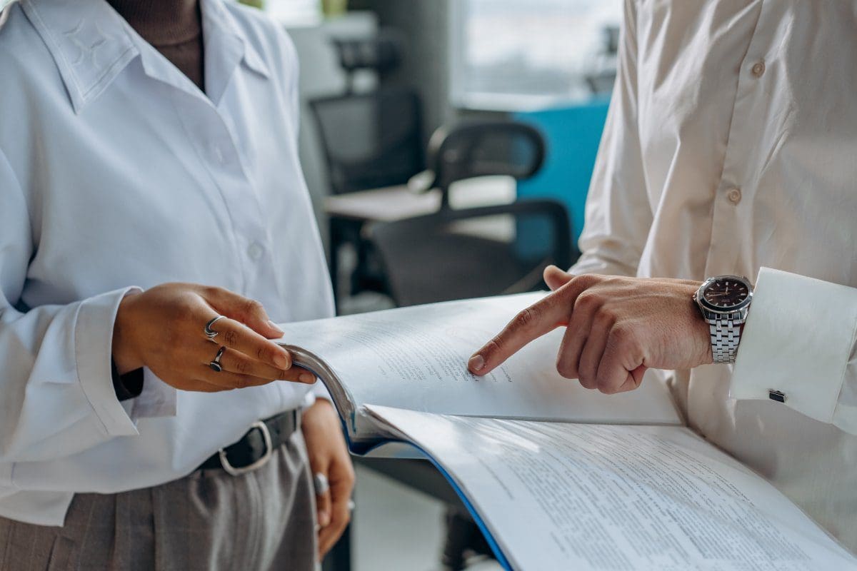 Business Man Pointing the Document